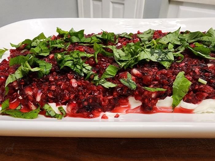 The Pomegranate and Cranberry Bruschetta plated as a dip to serve with gluten-free crackers